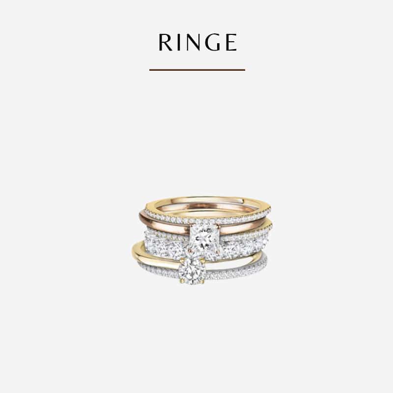 Drei elegante Ringe sind übereinander gestapelt und vor einem schlichten Hintergrund zu sehen. Die Diavon-Ringe bestehen aus verschiedenen Metallbändern, darunter Gold und Silber, die jeweils mit schimmernden Diamanten verziert sind. Der Text über den Ringen lautet „RINGE“.
