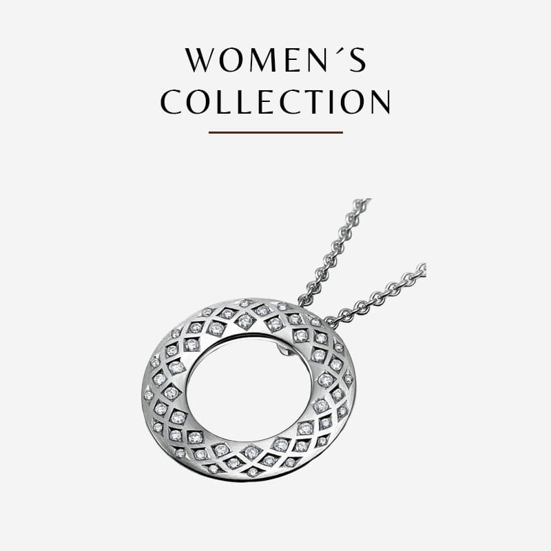 Präsentiert wird eine Silberkette mit einem runden Anhänger mit Gittermuster und kleinen Diamanten. Über der Kette ist deutlich der Text „WOMEN'S COLLECTION“ von Meister zu sehen.