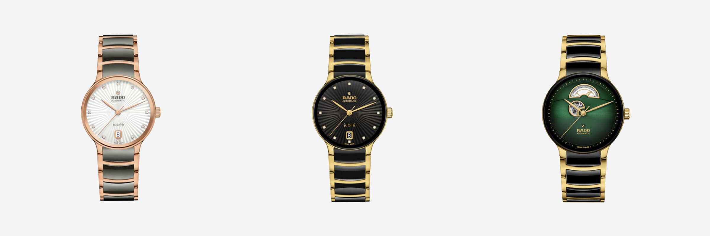 Drei elegante Armbanduhren sind vor einem weißen Hintergrund abgebildet. Die erste Uhr hat eine Roségoldlünette und ein weißes Zifferblatt. Die zweite Uhr hat eine goldene Lünette und ein schwarzes Zifferblatt. Die dritte Uhr hat eine goldene Lünette und ein grünes Zifferblatt mit einer Mondphasenanzeige. Jede Uhr hat ein Metallarmband.