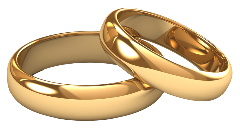 © Juwelier Wagner-Madler e.K. Zwei glänzende goldene Eheringe von Atelier Wagner-Madler sind ineinander verschlungen und ruhen auf weißem Hintergrund.