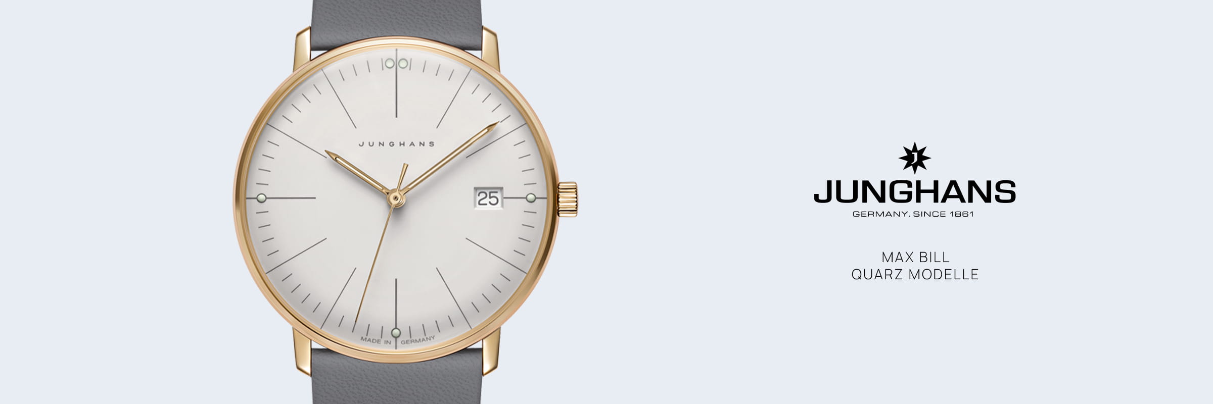 JUNGHANS © 2026 Eine Junghans Max Bill Quarz-Armbanduhr mit goldenem Gehäuse, weißem, minimalistischem Zifferblatt, Datumsanzeige und grauem Lederarmband wird neben dem Junghans-Logo und dem Markentext auf hellgrauem Hintergrund gezeigt.