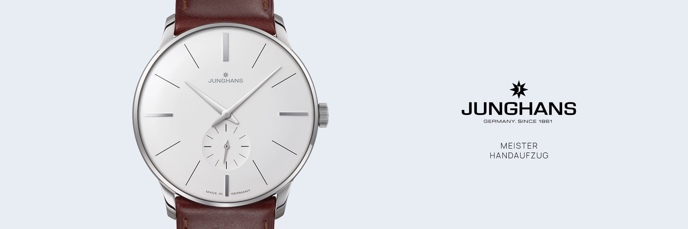 JUNGHANS © 2026 Eine Junghans Meister Handaufzug Armbanduhr mit weißem Zifferblatt, silbernen Markierungen und Zeigern, kleiner Sekundenanzeige und braunem Lederband. Das Junghans Meister Handaufzug Logo und "Germany since 1861" sind auf der rechten Seite abgebildet.